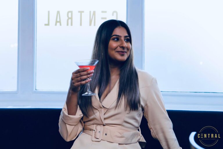 A guest enjoying a cocktail at Central