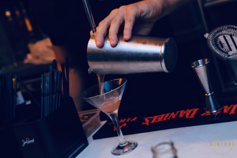 Bartender pouring a cocktail