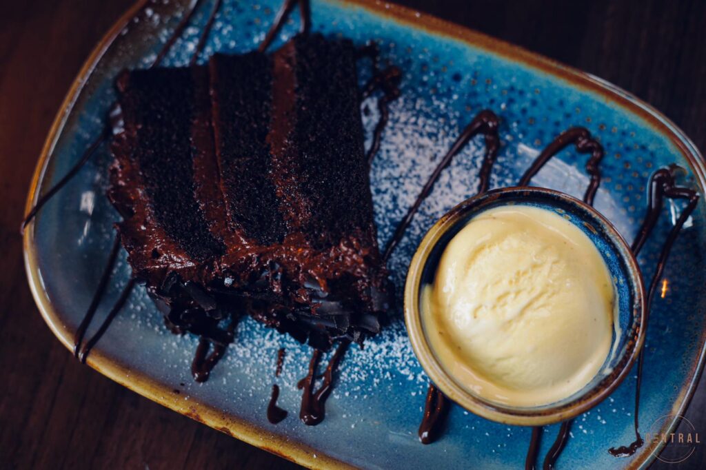 Chocolate cake with a scoop of ice cream