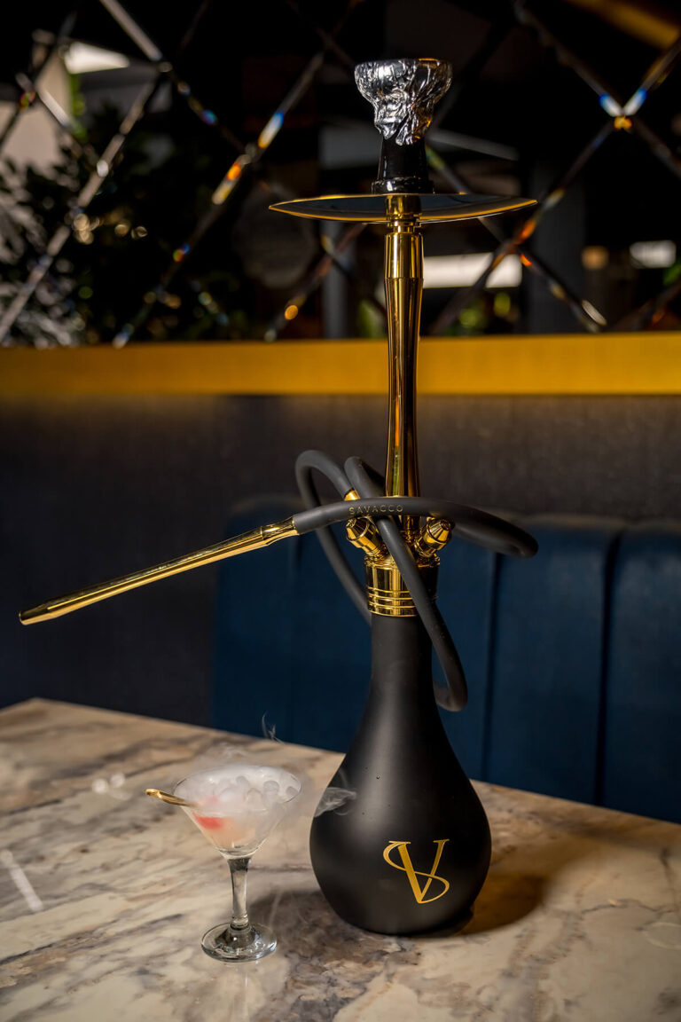 A shisha pipe on a marble table in the lounge