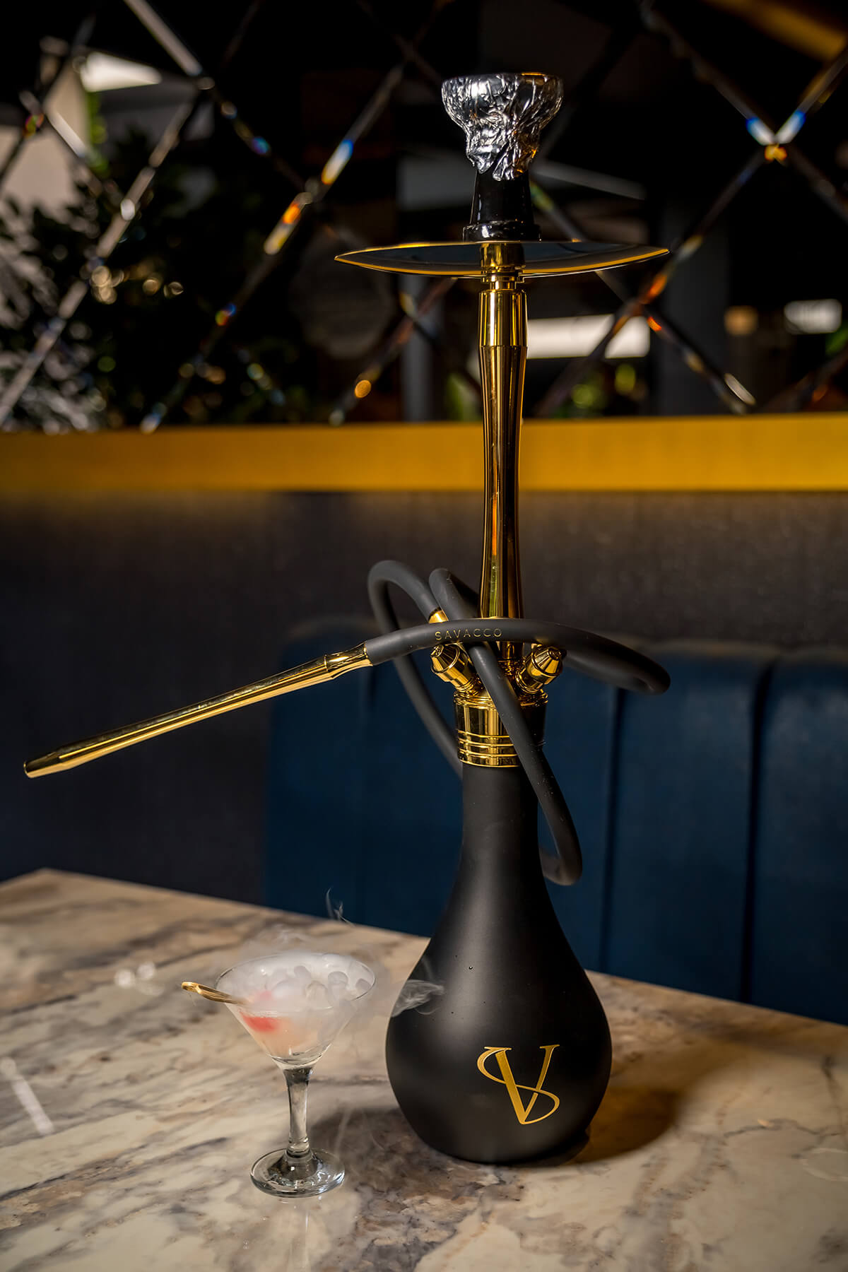 A shisha pipe on a marble table in the lounge